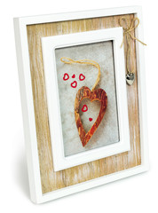 Decorative wooden photo frame with hearts. 