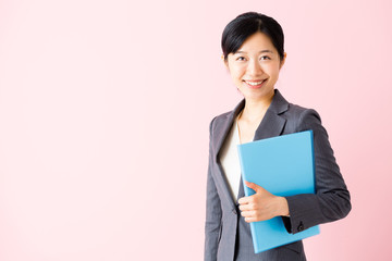 asian businesswoman isolated on pink background