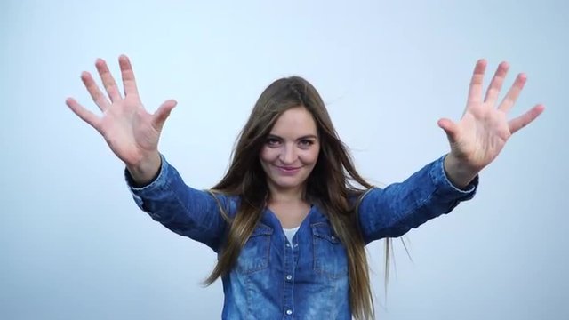 Woman raising hands arms up. Funny girl 4K