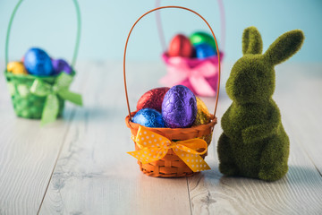 Easter eggs in a basket with a bunny