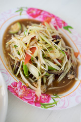 Thai delicious raw papaya salad with unique taste hot and spicy,