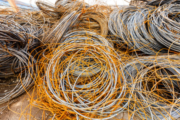 Pile up clutter rusty metal steel wire in Steel mills