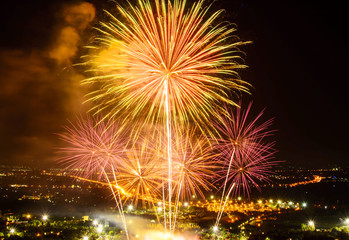 Fireworks on night city background