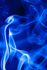 Obraz premium Movement blue smoke on black background.