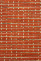 Fototapeta na wymiar red brick wall background, vertical composition