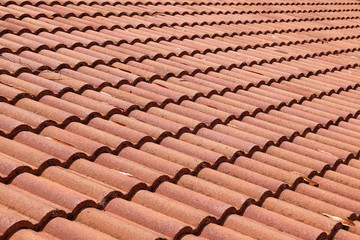 brown tile roof weathered on building residential
