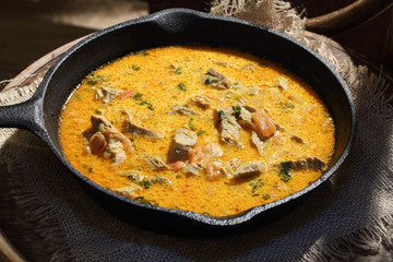  Stewed meat with a coriander and tomatoes with white sauce