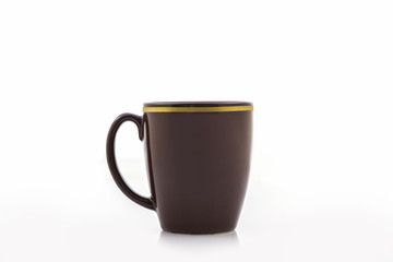 Brown mug from coffee.