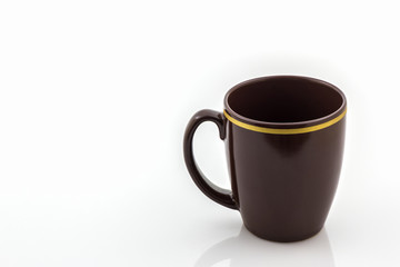 Brown mug from coffee.