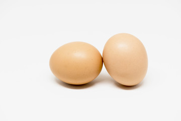 Organics chicken eggs on white backgound 