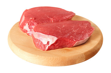 Fresh beef on board ready to cook isolated