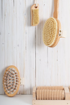 Wooden comb massagersg brushes on wooden planks