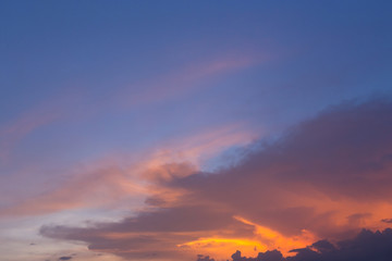 colorful dramatic sunset sky with orange cloud, twilight sky