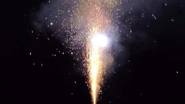 exploding firework slow motion - sparkling fire macro