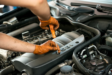 Mechanic working on a car engine