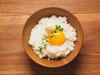 Warm rice with egg york