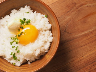 Warm rice with egg york