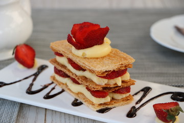 Strawberries Mille Feuille Cake in white plate