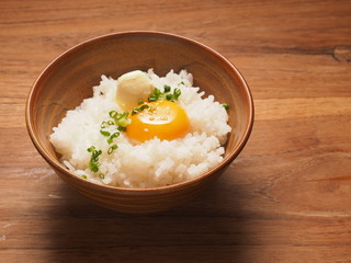 Warm rice with egg york