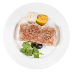 top view of portion of meat aspic on white plate
