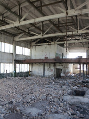 Fototapeta na wymiar Destroyed factory inside