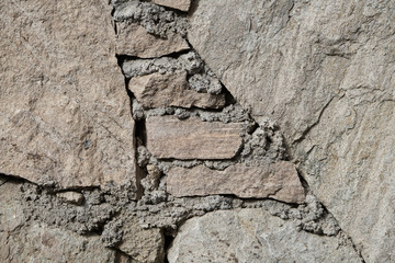 wall of big and small natural stones