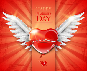Valentine's day greeting card with white angel wings and red heart-shaped balloon.