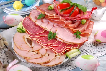 Fototapeten platter of cured meat,ham and salami on eater table © teressa