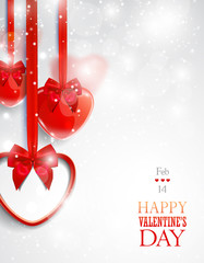Valentine's day greeting card with red heart-shaped decorative items.