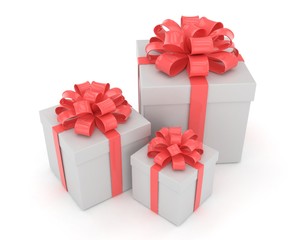 three gift boxes with bows isolated on white