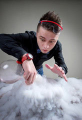 magician in chemical laboratory prepares magical solution