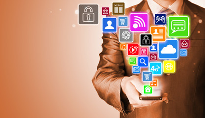 Business man using smart phone with social media icon set