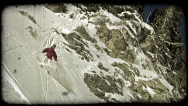 Expert skier skis down moutain. Vintage stylized video clip.