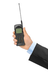 Hand with retro mobile phone
