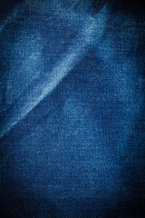 Naklejka premium Vintage Blue torn denim jeans texture.