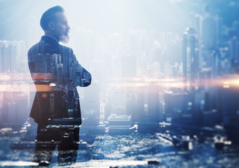 Double exposure photo a businessman and view of the city