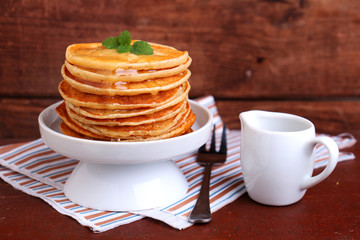 making pancakes on Shrove Tuesday in a white bowl