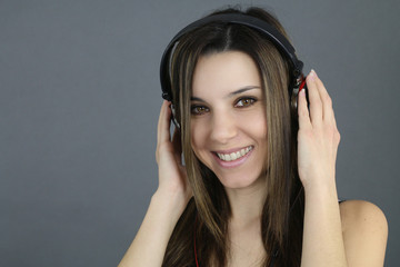 beautiful girl holding a headphone