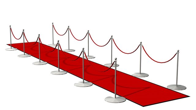 red carpet with silver stanchions  isolated on white