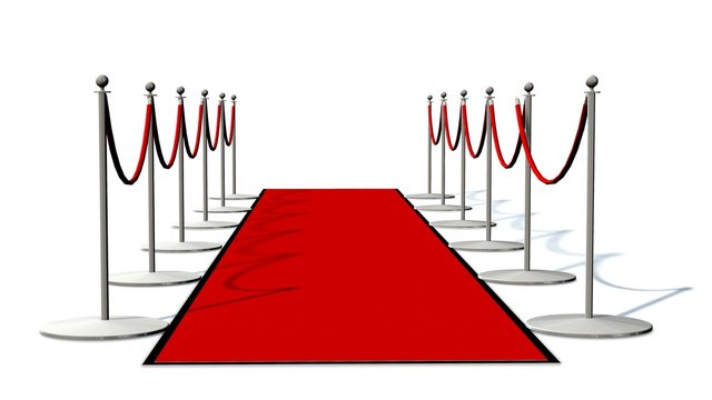 red carpet with silver stanchions  isolated on white