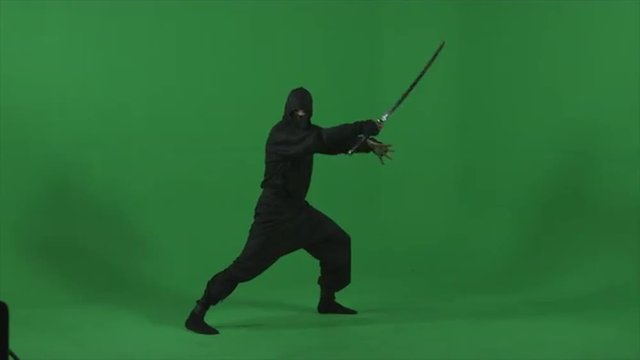 Ninja flourishes his sword, performs kicks and flips expertly in studio