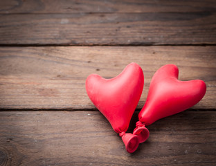 Valentine day concept.heart balloon on wood