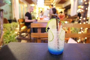 Blue cocktail with lime