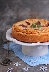 cake stuffed with almond and fig in a white plate