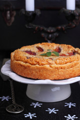 cake stuffed with almond and fig in a white plate