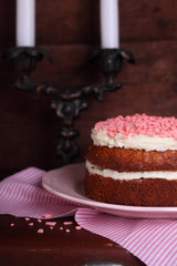 Banana cake with cream in a white dish