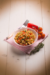 pasta with capsicum tomatoes and thymus