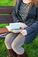 Fototapeta premium Woman reading a book
