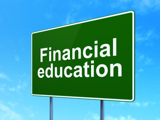 Education concept: Financial Education on road sign background