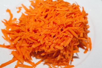 Closeup of grated carrot with selective focus